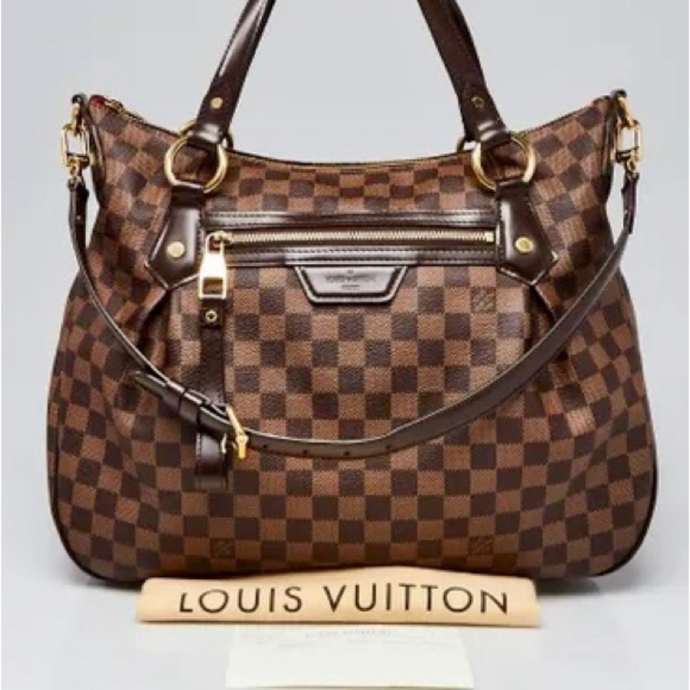 LOUIS VUITTON
Damier Canvas Evora MM Bag
